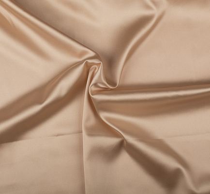 Tessuto di raso elasticizzato oro rosa